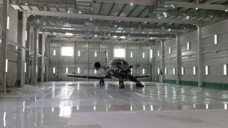 Aircraft spray booth interior with a light aircraft