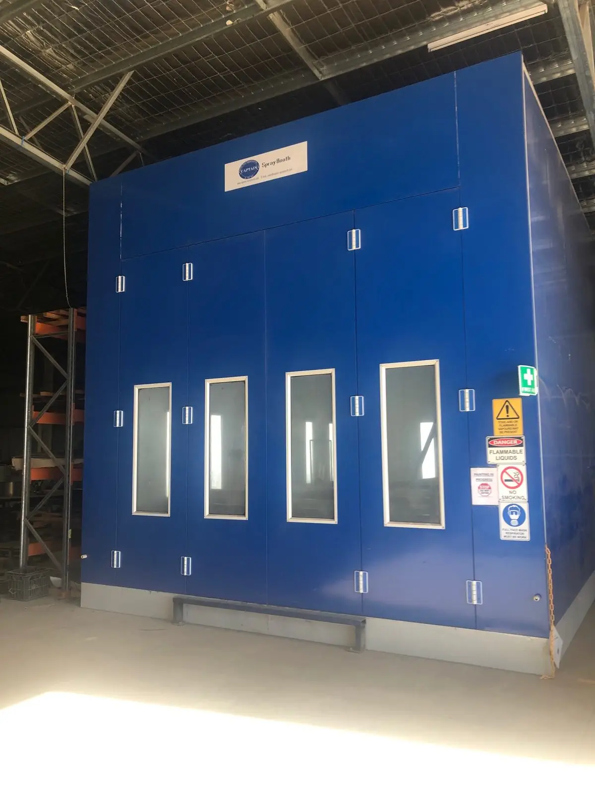 Blue industrial spray booth