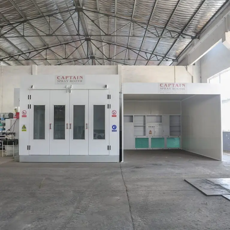 Car spray booth beside an open preparation bay