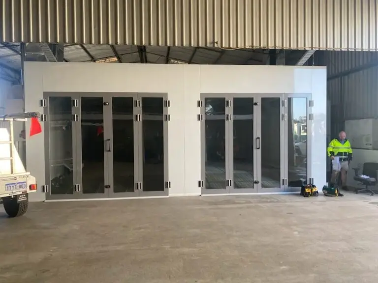 Large vehicle spray booth with glass folding doors
